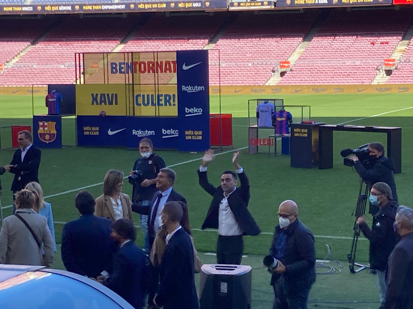 Xavi Hernádez waves to fans in the Camp Nou after being presented as the new manager of FC Barcelona (by Cillian Shields)